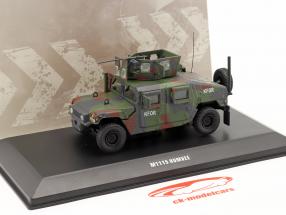 M1115 Humvee KFOR Véhicule militaire camouflage 1:48 Solido