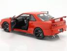 Nissan Skyline GT-R (R34) Baujahr 1999 rot 1:18 Solido