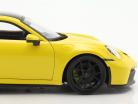 Porsche 911 (992) GT3 year 2022 racing yellow 1:18 Maisto
