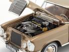 Mercedes-Benz 250 SE Coupe (W111) Byggeår 1969 guld metallisk 1:18 Norev