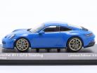 Porsche 911 (992) GT3 Touring 2021 tiburón azul / dorado llantas 1:43 Minichamps