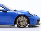 Porsche 911 (992) GT3 2021 акула синий / золотой автомобильные диски 1:18 Minichamps