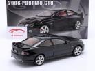 Pontiac GTO Byggeår 2006 sort 1:18 GMP