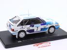 Mazda 323 4WD #7 winner rally Sweden 1989 I. Carlsson, P. Carlsson 1:24 Altaya