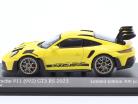Porsche 911 (992) GT3 RS 2023 giallo / d'oro cerchi 1:43 Minichamps