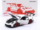 Porsche 911 (992) GT3 RS year 2022 white / red rims 1:18 Minichamps