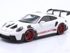 Porsche 911 (992) GT3 RS Bouwjaar 2022 wit / Rood velgen 1:18 Minichamps