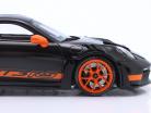 Porsche 911 (992) GT3 RS Bouwjaar 2022 zwart / oranje velgen 1:18 Minichamps