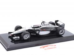 M. Häkkinen McLaren MP4/14 #1 formula 1 World Champion 1999 1:24 Premium Collectibles