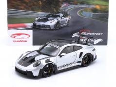 Porsche 911 (992) GT3 RS Weissach package 2022 silver / black rims 1:18 Minichamps