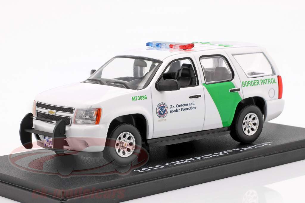 Chevrolet Tahoe Border Patrol year 2010 white / green 1:43 Greenlight