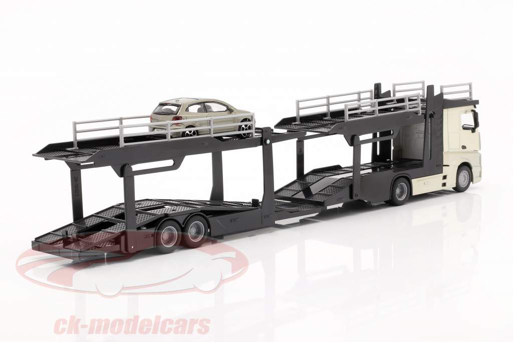 Mercedes-Benz Actros カートランスポーター とともに VW Polo GTI ゴールド / 黒 / グレー メタリック 1:43 Bburago