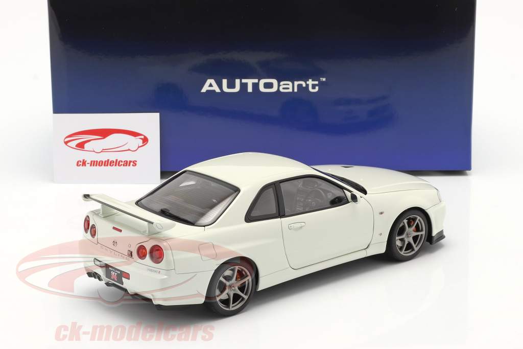 Nissan Skyline GT-R (R34) V-Spec II Año de construcción 2001 perla blanco 1:18 AUTOart
