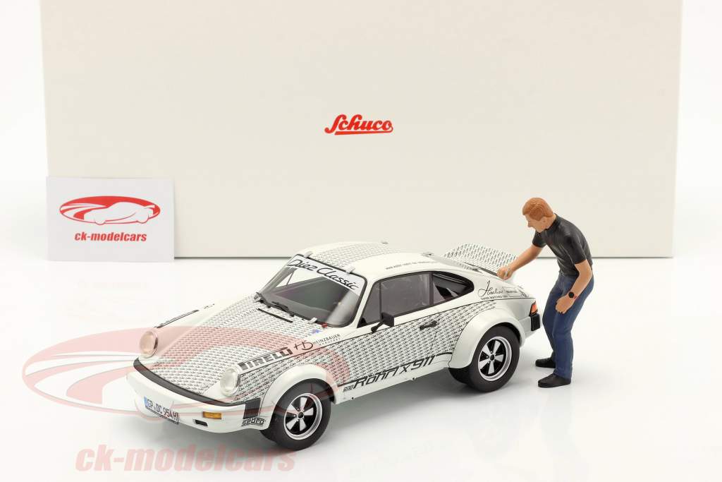 Porsche 911 Walter Röhrl x911 mit Figur weiß / schwarz 1:18 Schuco