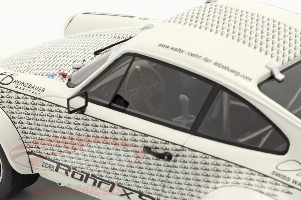 Porsche 911 Walter Röhrl x911 mit Figur weiß / schwarz 1:18 Schuco