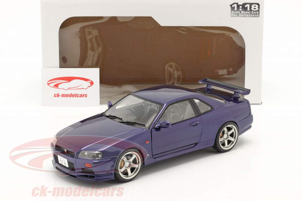 Nissan GT-R (R34) Año de construcción 1999 Violeta 1:18 Solido