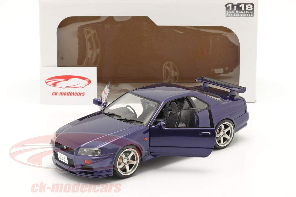 Nissan GT-R (R34) Année de construction 1999 violet 1:18 Solido