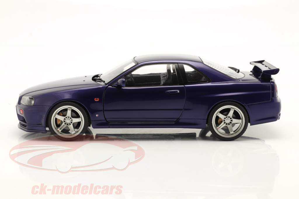 Nissan GT-R (R34) year 1999 violet 1:18 Solido