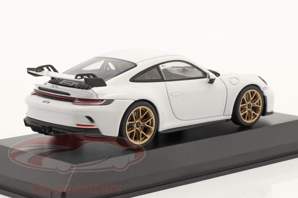 Porsche 911 (992) GT3 year 2020 white / golden rims 1:43 Minichamps