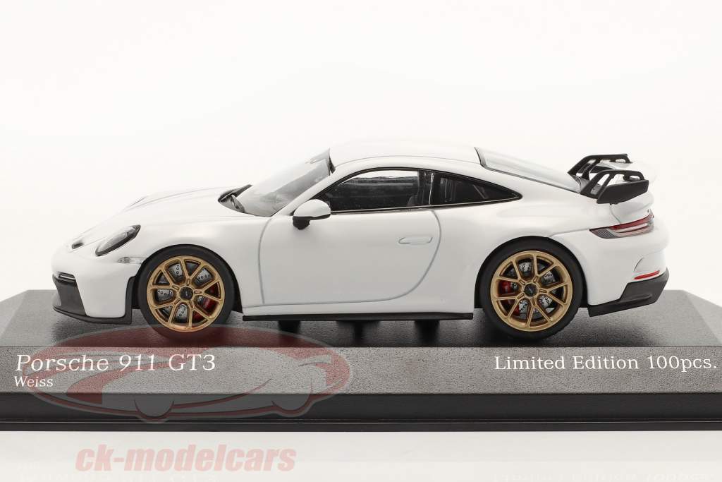 Porsche 911 (992) GT3 year 2020 white / golden rims 1:43 Minichamps