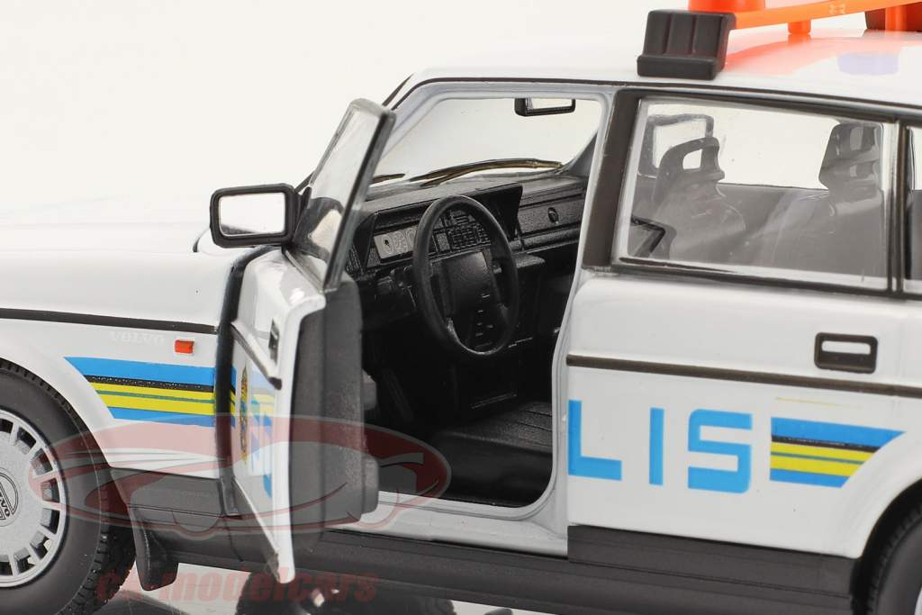 Volvo 240 GL Polis (Policía Suecia) 1986 blanco / azul / amarillo 1:24 Welly