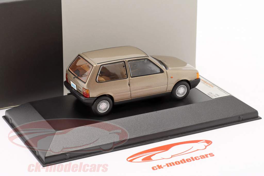 Fiat Uno Año 1983 de color marrón claro 1:43 Premium X