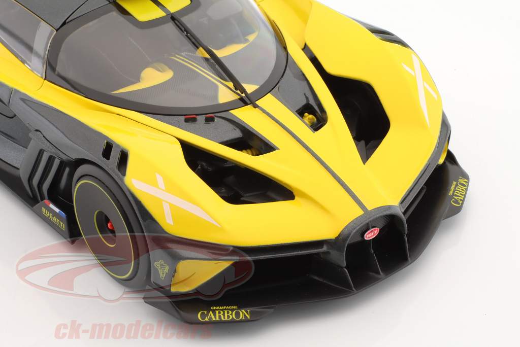 Bugatti Bolide W16.4 bouwjaar 2020 geel / koolstof 1:18 Bburago