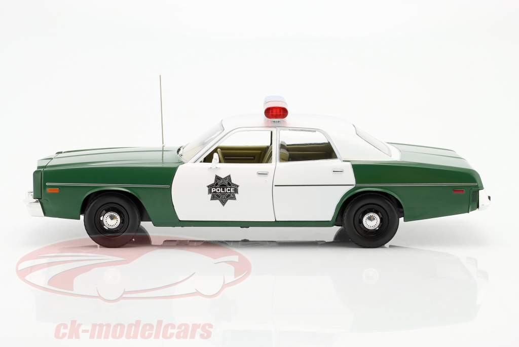 Plymouth Fury Capitol City Police Année de construction 1975 vert / Blanc 1:18 Greenlight