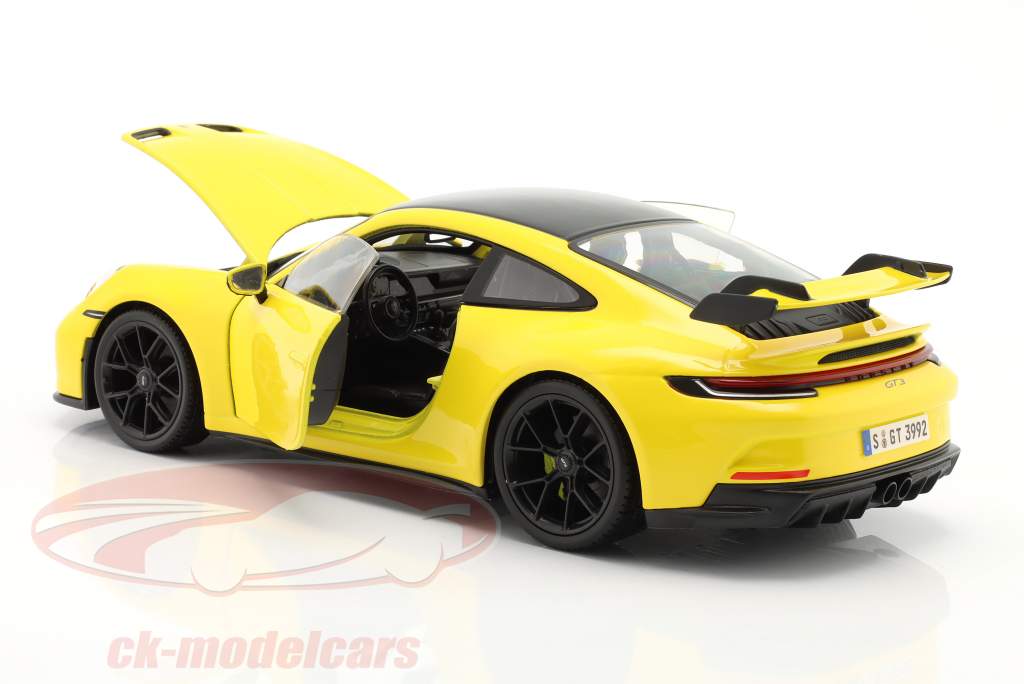 Porsche 911 (992) GT3 Baujahr 2022 racing gelb 1:18 Maisto