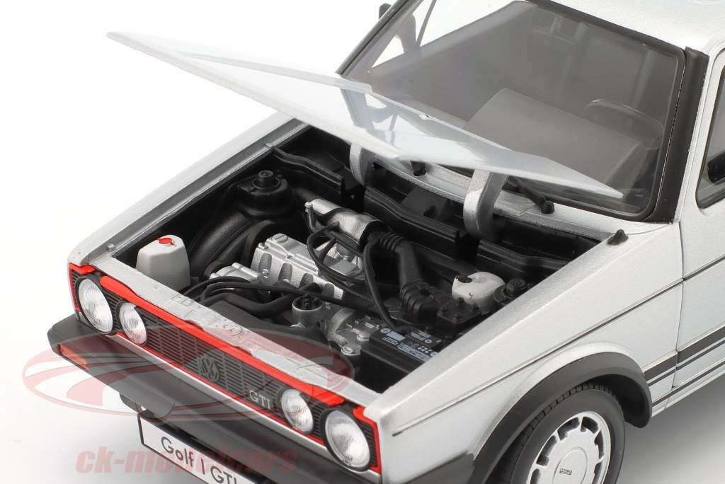 Volkswagen VW Golf I GTI серебро 1:18 Welly