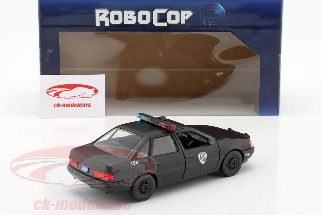 Ford Taurus OCP Byggeår 1986 Film Robocop med figur Robocop 1:24 Jada Toys