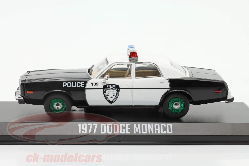 Dodge Monaco Police Año de construcción 1977 negro / Blanco / verde llantas 1:43 Greenlight