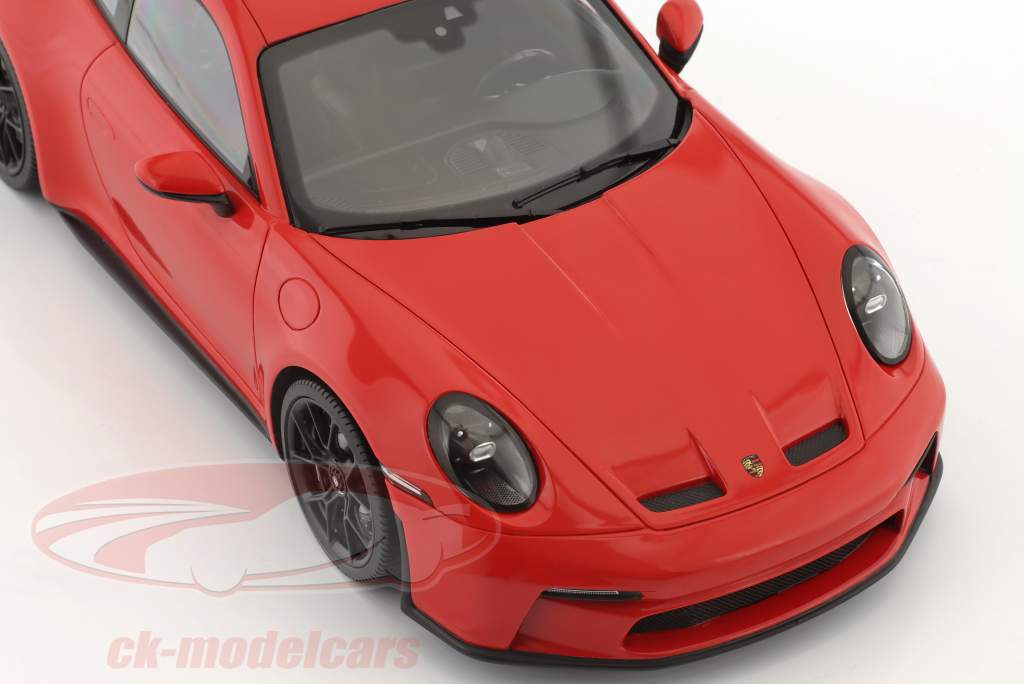 Porsche 911 (992) GT3 Touring 2022 guards red / black rims 1:18 Minichamps