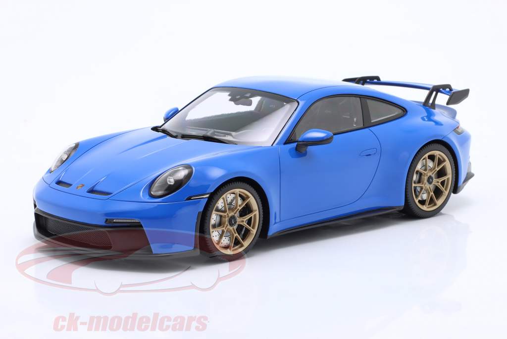 Porsche 911 (992) GT3 2021 tiburón azul / dorado llantas 1:18 Minichamps
