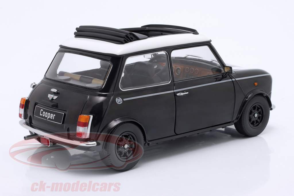 Mini Cooper mit Schiebedach schwarz metallic / weiß LHD 1:12 KK-Scale