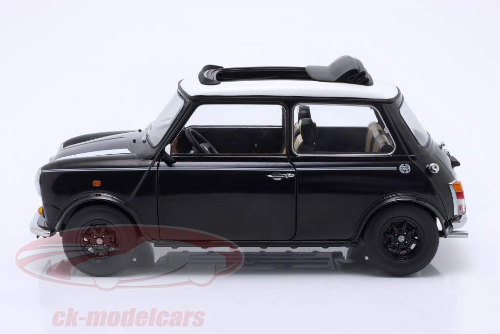Mini Cooper con tetto apribile nero metallico / bianco LHD 1:12 KK-Scale