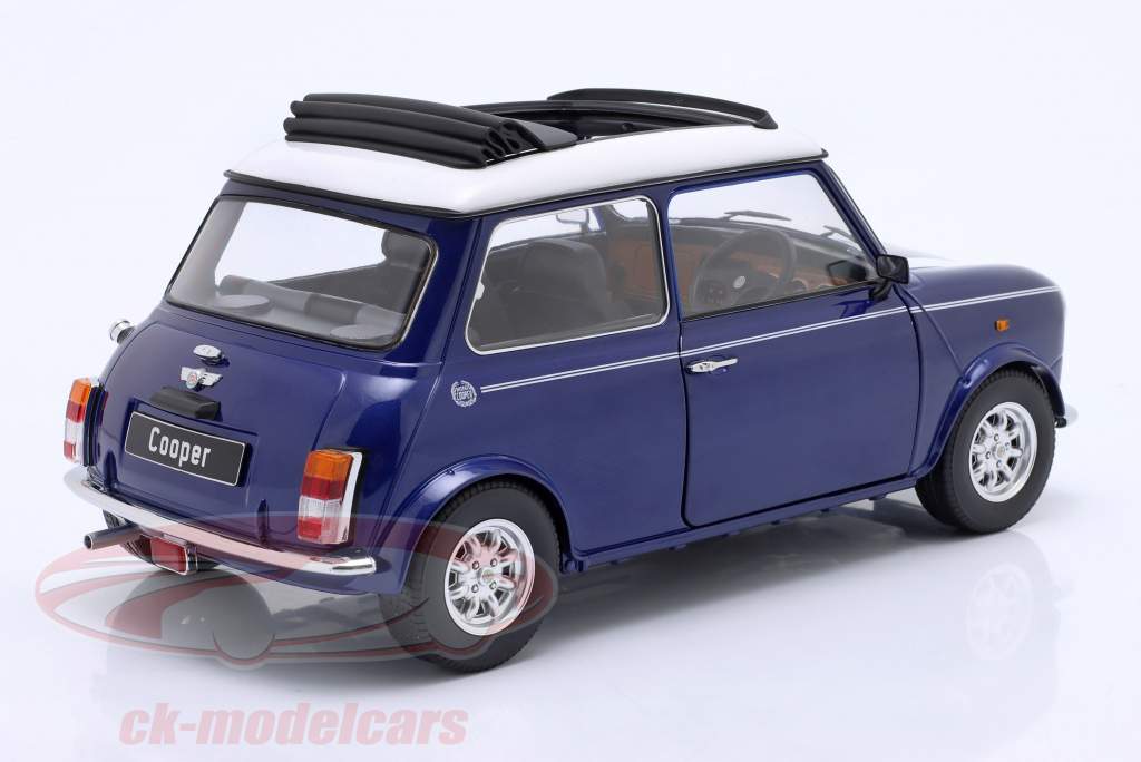Mini Cooper avec toit ouvrant bleu métallique / blanc RHD 1:12 KK-Scale