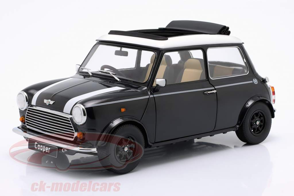 Mini Cooper avec toit ouvrant noir métallique / blanc RHD 1:12 KK-Scale