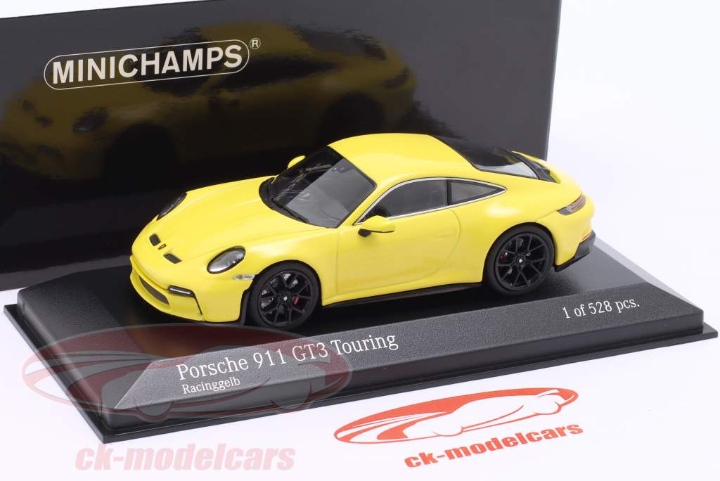 Porsche 911 (992) GT3 Touring 2021 racing amarillo / negro llantas 1:43 Minichamps