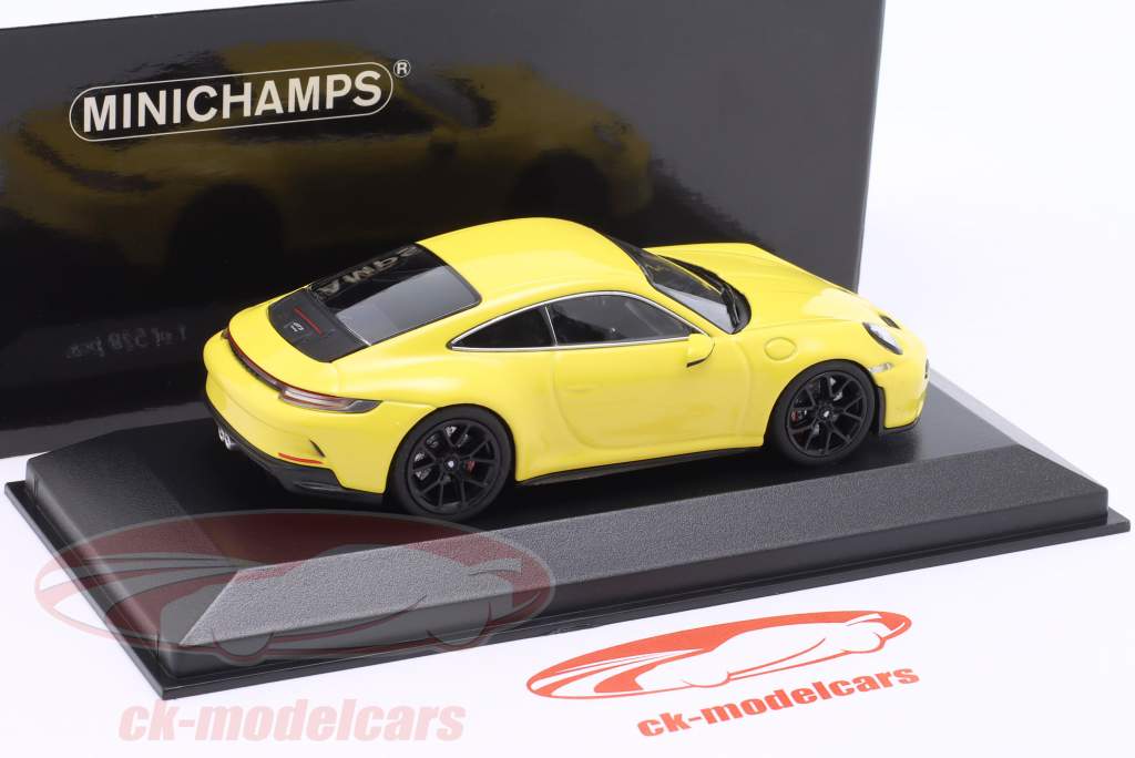 Porsche 911 (992) GT3 Touring 2021 racing желтый / черный автомобильные диски 1:43 Minichamps
