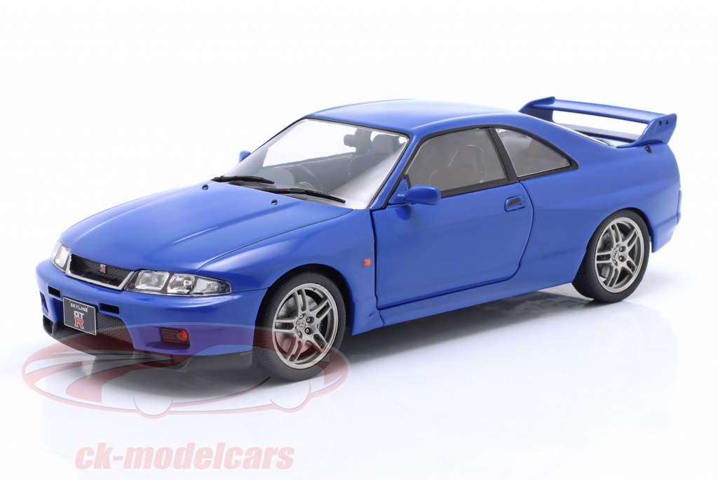 Nissan Skyline GT-R (R33) RHD Год постройки 1997 синий 1:24 WhiteBox