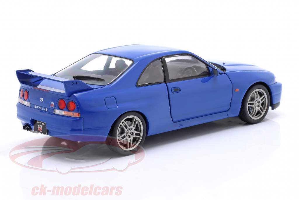 Nissan Skyline GT-R (R33) RHD Anno di costruzione 1997 blu 1:24 WhiteBox