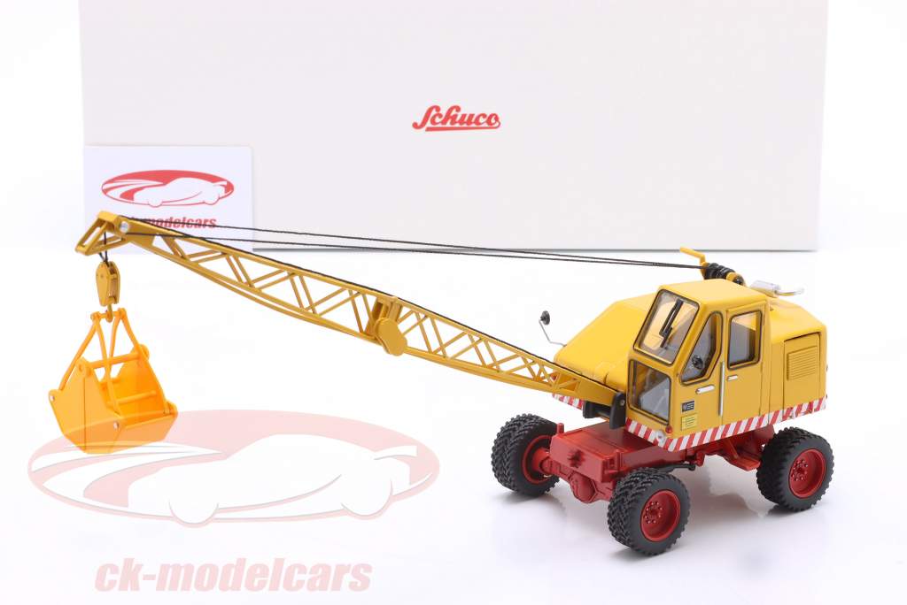 Fuchs Excavator 301 with shovel and wrecking ball yellow 1:32 Schuco