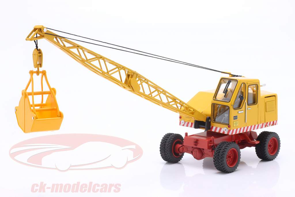 Fuchs Excavator 301 with shovel and wrecking ball yellow 1:32 Schuco