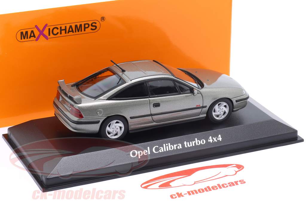 Opel Calibra Turbo 4x4 Bouwjaar 1992 Grijs metalen 1:43 Minichamps