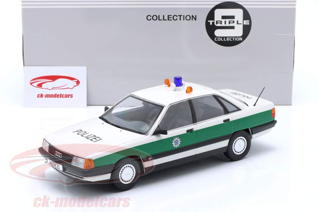 Audi 100 C3 полиция Год постройки 1989 зеленый / белый 1:18 Triple9