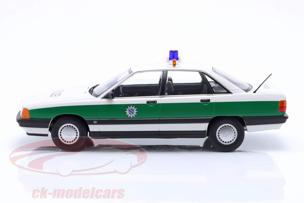 Audi 100 C3 полиция Год постройки 1989 зеленый / белый 1:18 Triple9
