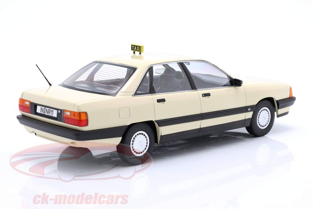 Audi 100 C3 Taxi Año de construcción 1989 Marfil 1:18 Triple9