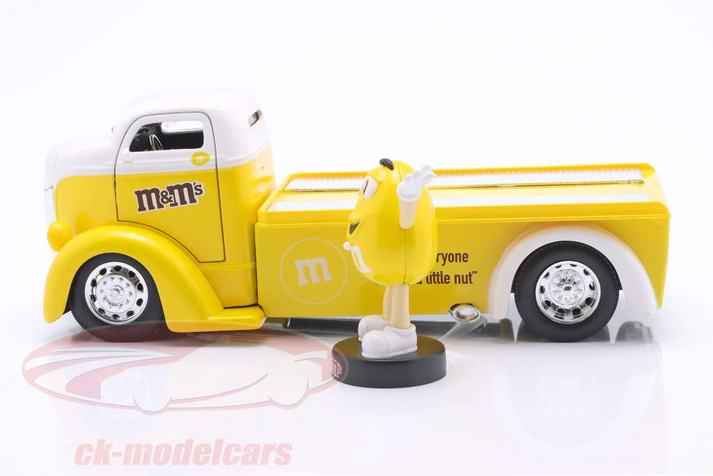 Ford COE Flatbed 1947 con M&Ms cifra Amarillo 1:24 Jada Toys