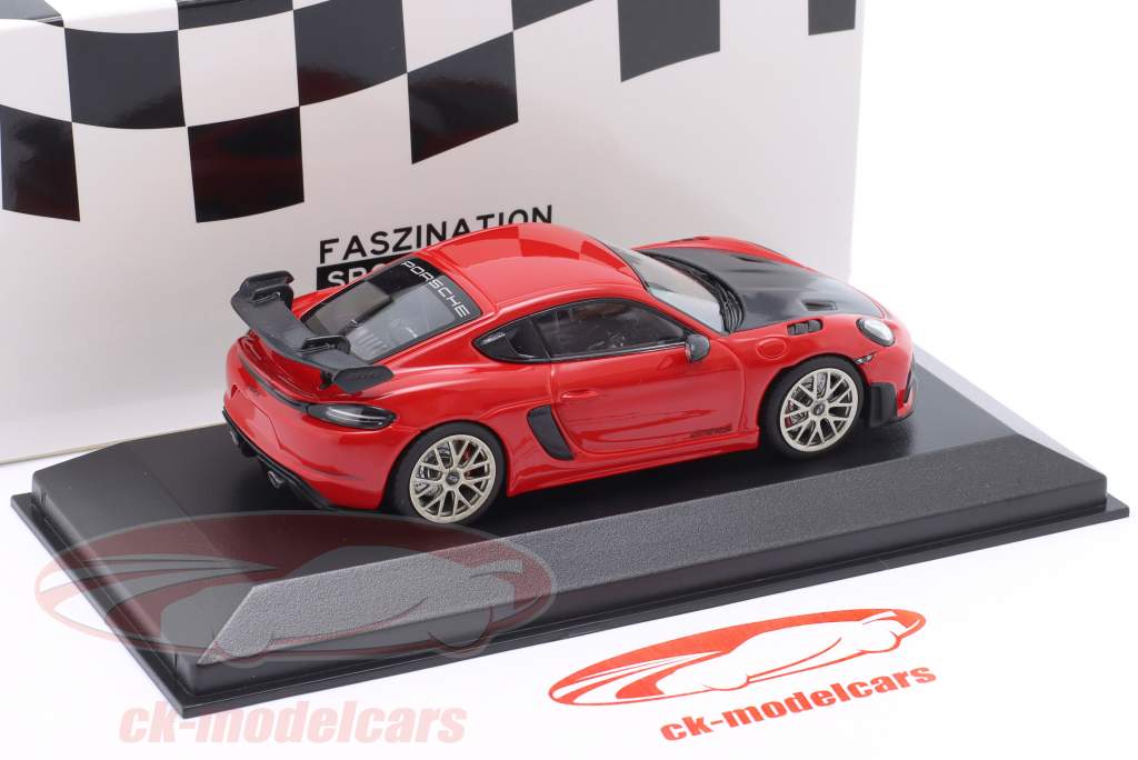 Porsche 718 (982) Cayman GT4 RS 2021 red / Neodymium rims 1:43 Minichamps